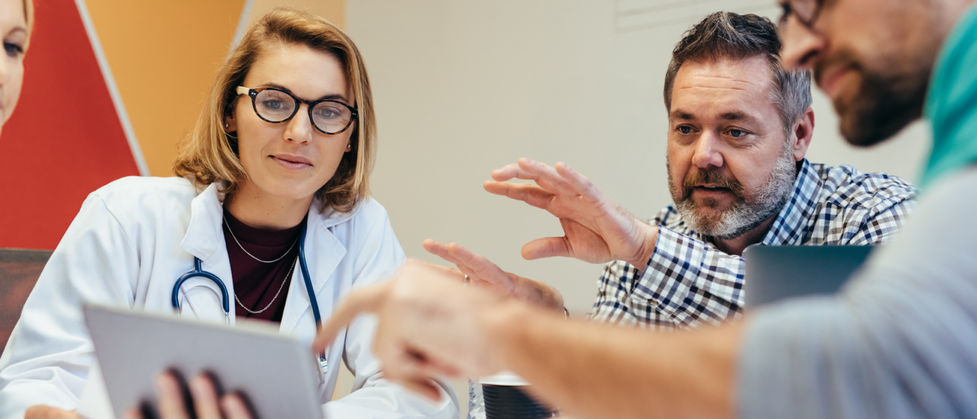 Doctor of Nursing Practice (DNP) meeting with team.