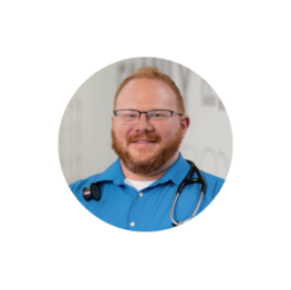 Devon Garcia, a man with red hair and beard.