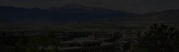 The University of Colorado Colorado Springs campus in the foreground with Pikes Peak and the front range in the background