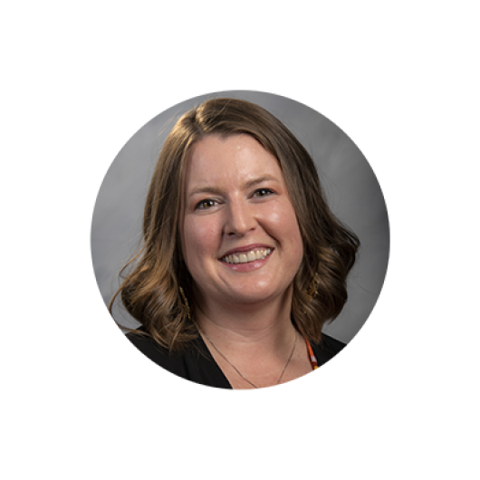 Headshot of a graduate of the online MA Communication degree program Alicia