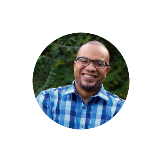 Branden W. smiling alumni headshot.