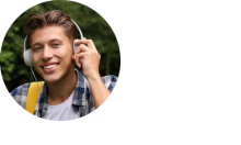Handsome young man wearing headphones and yellow backpack, smiling.