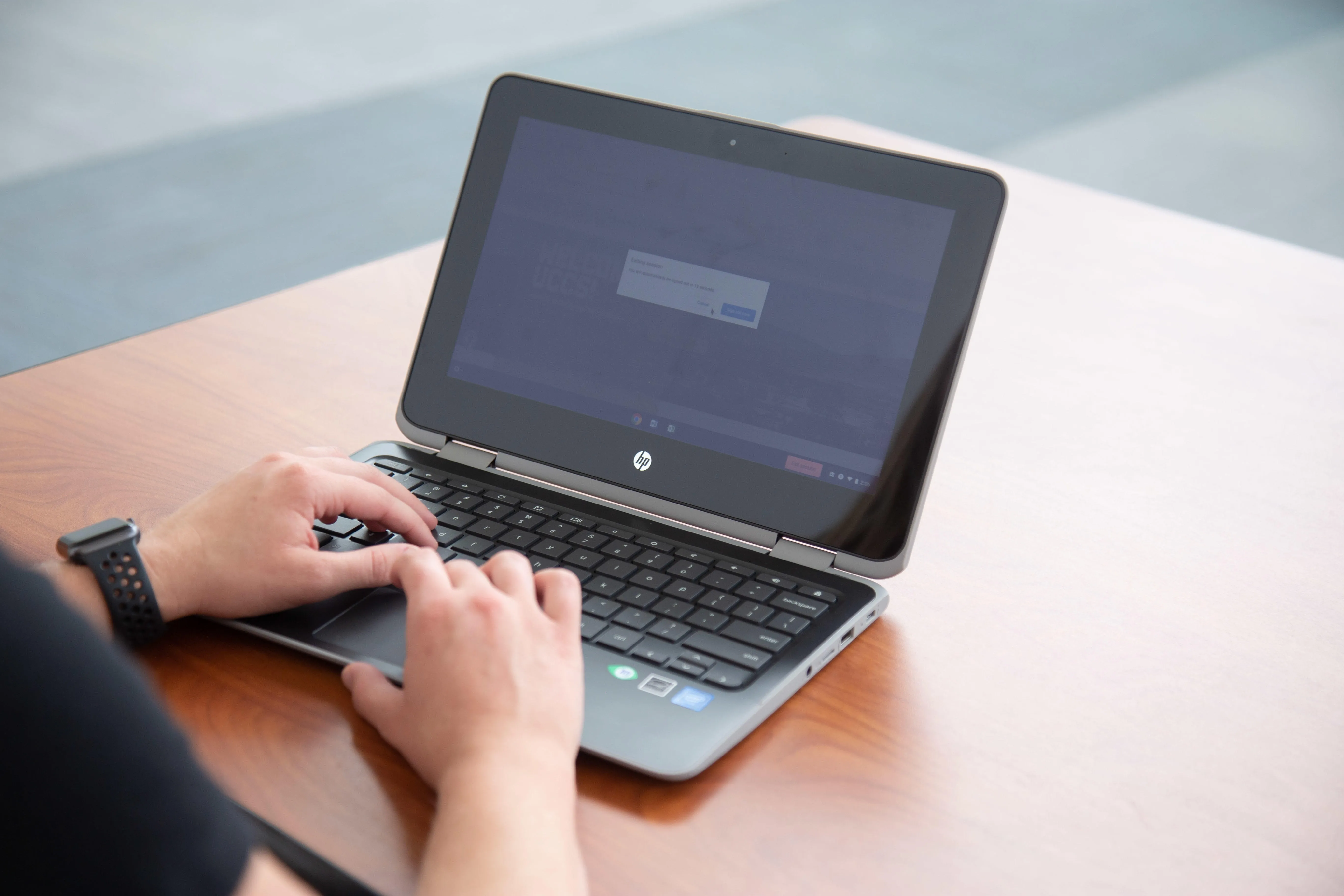 student working on their laptop